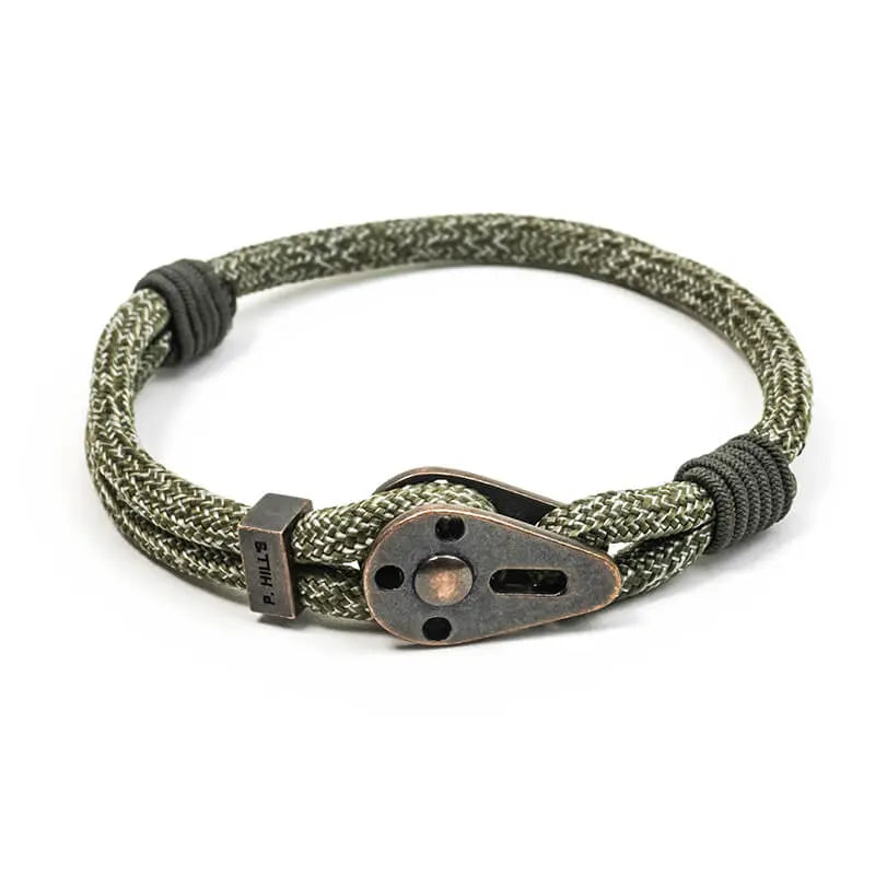 Bracelet ajustable Everglades en cordon vert chiné et poulie cuivrée, fabriqué en France